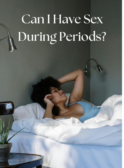 girl on her periods lying down in bed